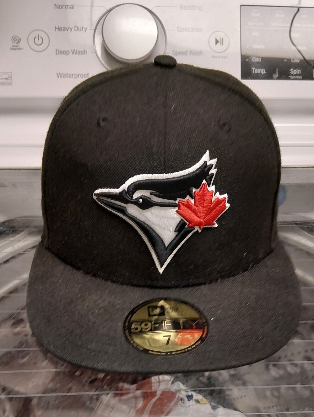 New Era Black Toronto Blue Jays Fitted Hat with Red Maple Leaf Size 7
